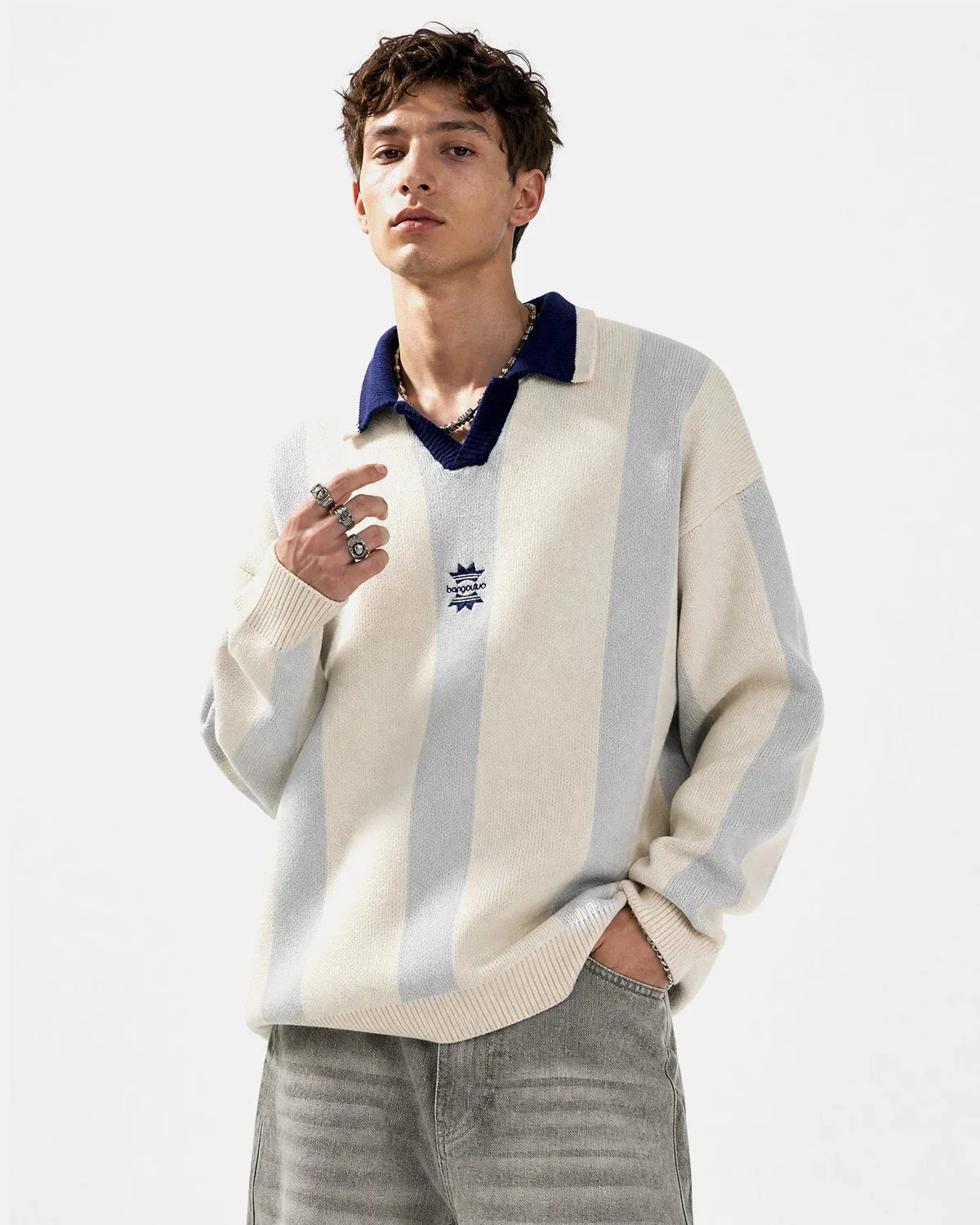 Close-up of the knitted texture on a striped polo sweater