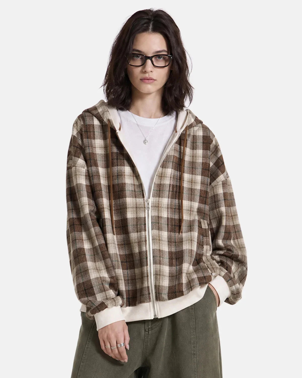 Everyday styling view of the plaid zip-up hoodie