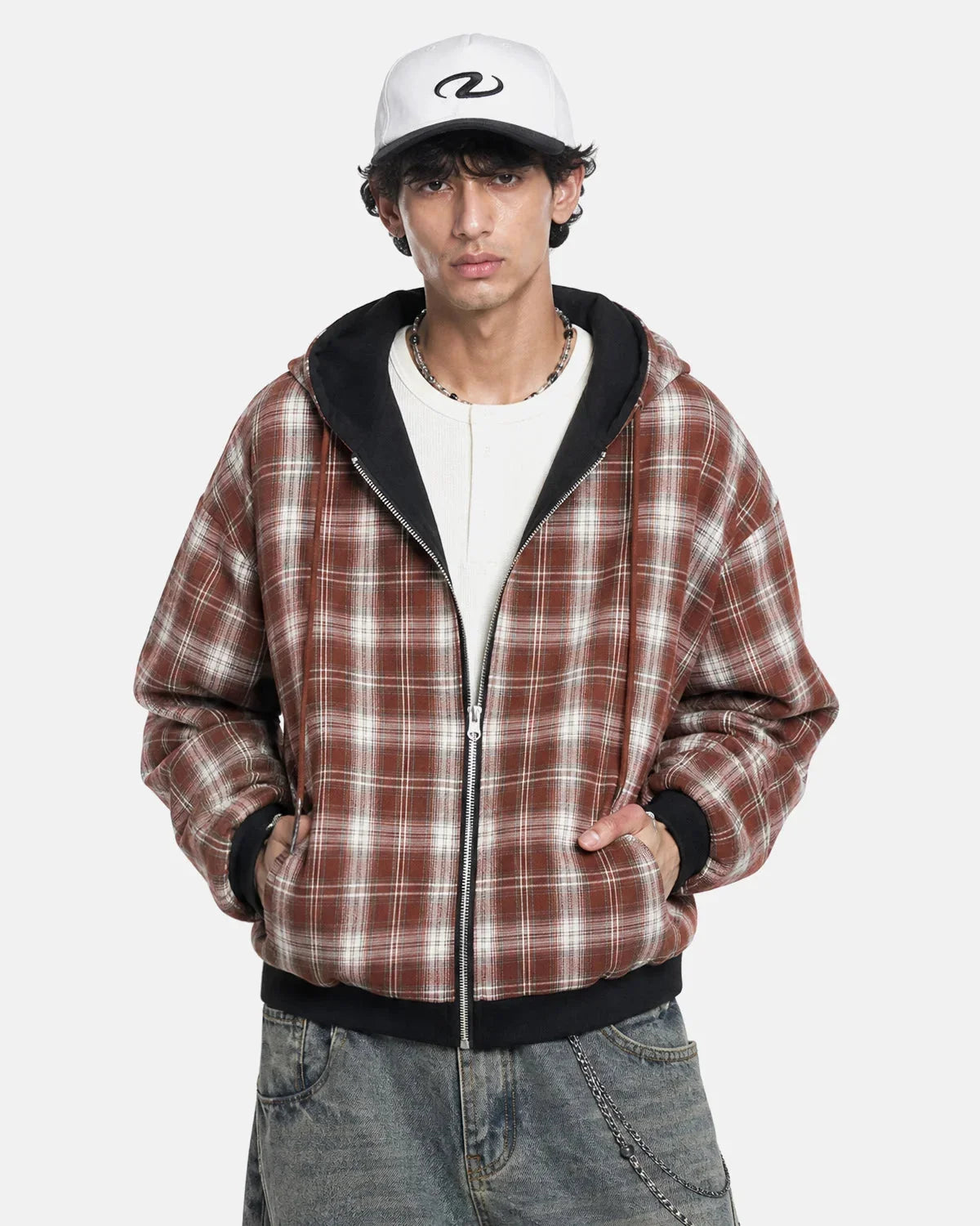 Reversible plaid boxy zip-up hoodie shown from the front