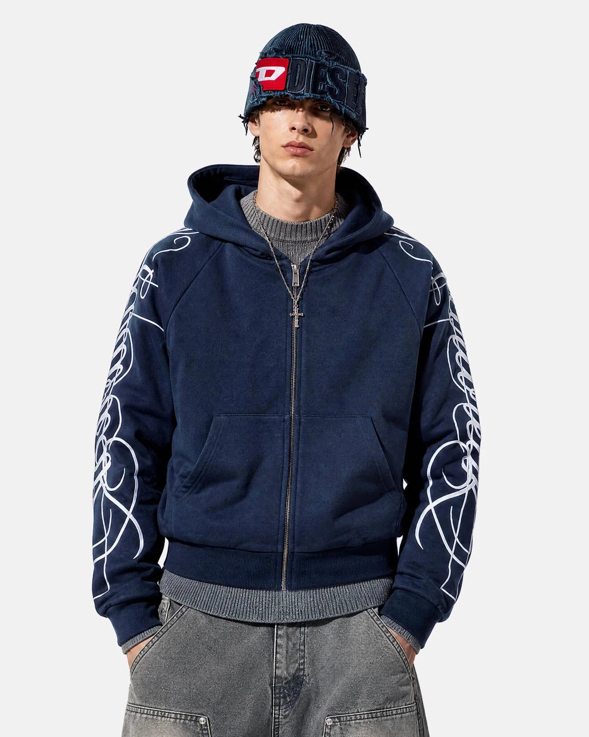 Detail of the hem on the graphic raglan sleeve hoodie