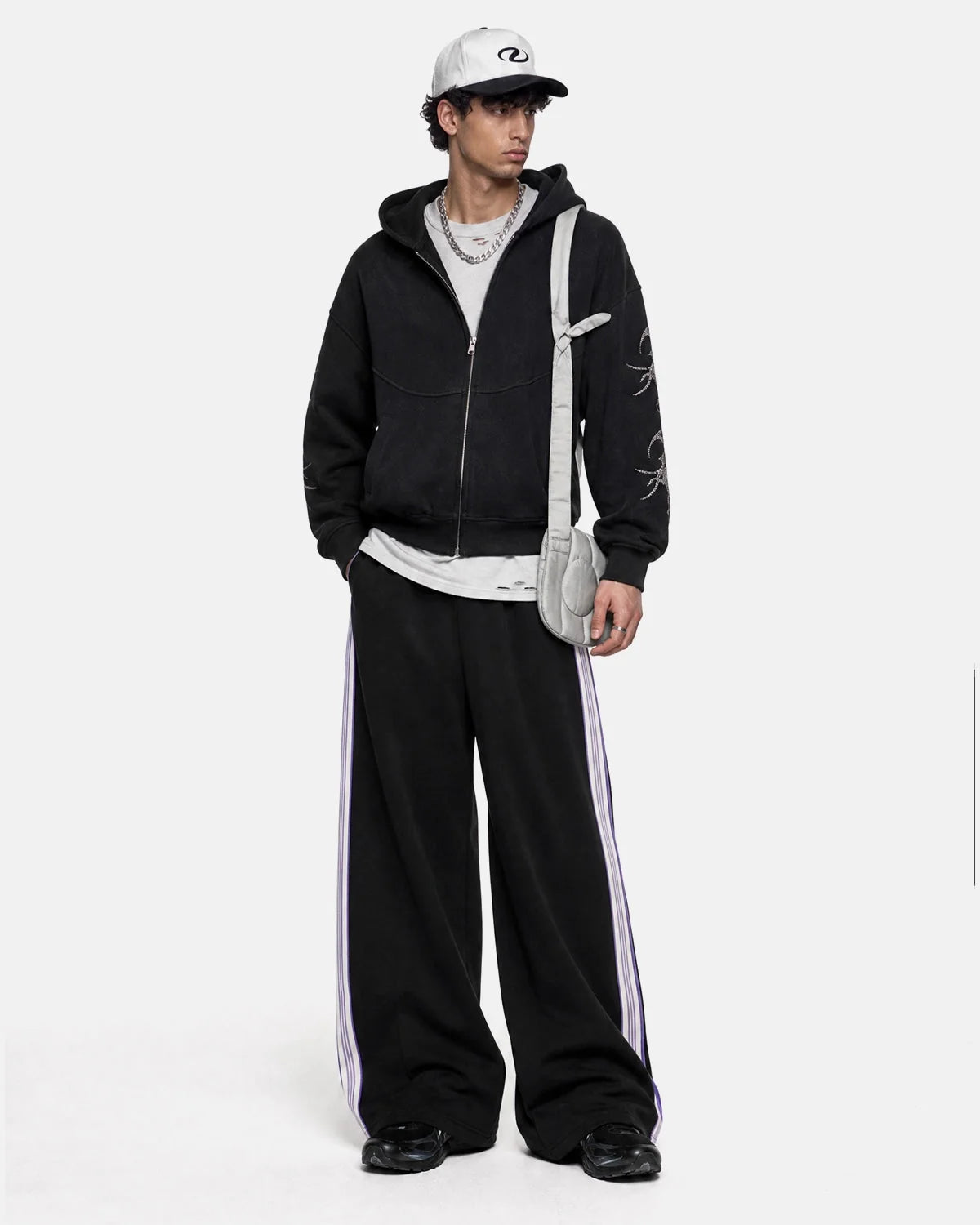 Wide-leg track trousers styled for casual everyday wear