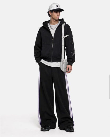 Wide-leg track trousers styled for casual everyday wear