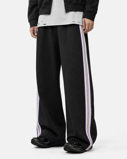 Close-up of the side stripe detail on track trousers