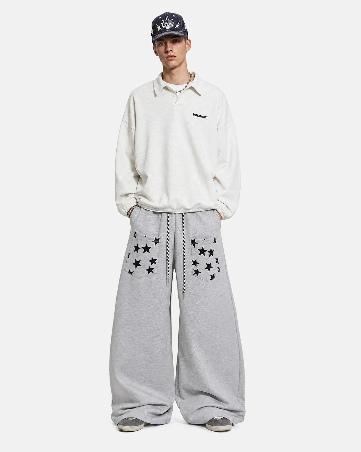 Detail of the cuffed hems on the barrel-leg joggers