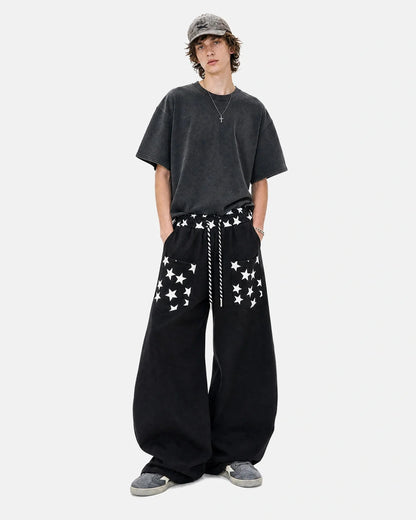 Close-up of the star graphic on the barrel-leg joggers