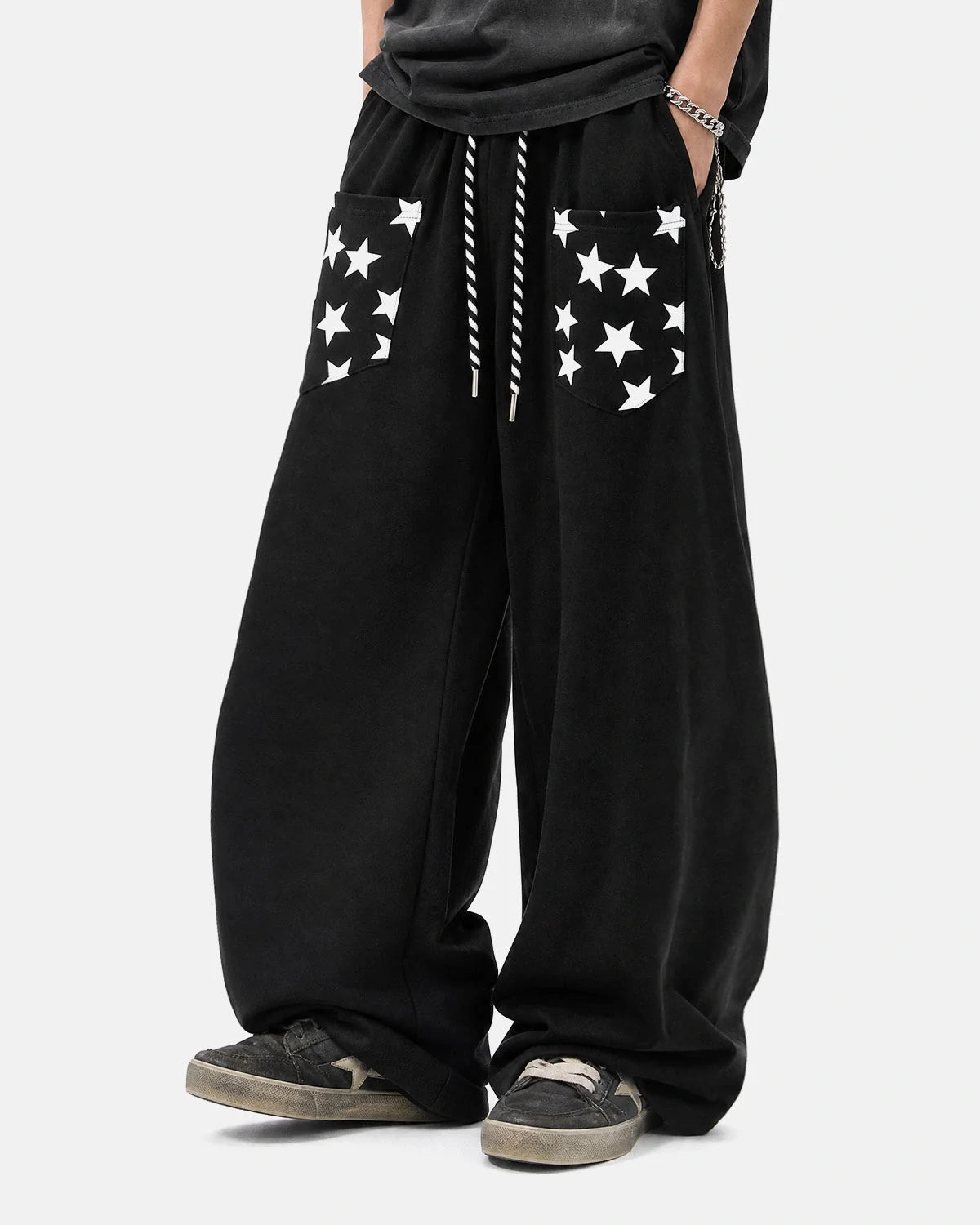 Barrel-leg joggers showing the elasticated waistband