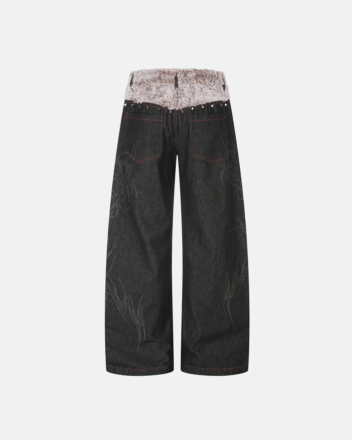 Close-up of the studded faux fur waistband on baggy jeans