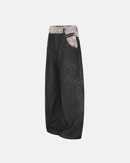 Baggy jeans displaying the textured faux fur waistband detail