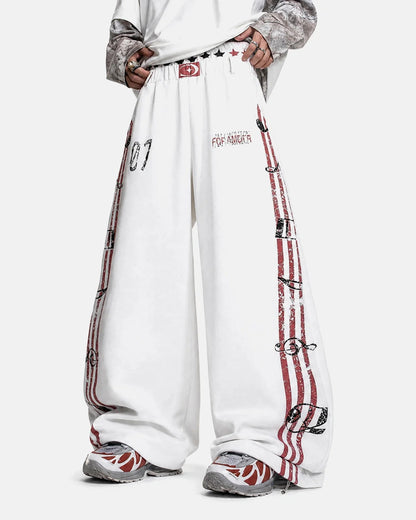 Side view of music graphic barrel-leg joggers