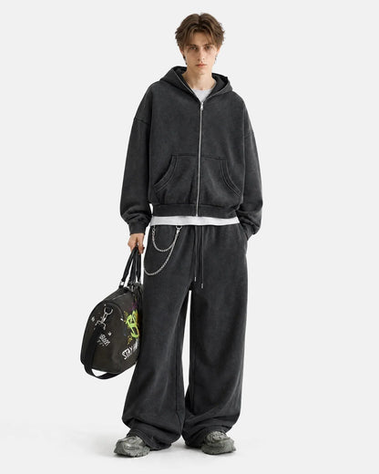 Side view showing the loose silhouette of the sweatpants